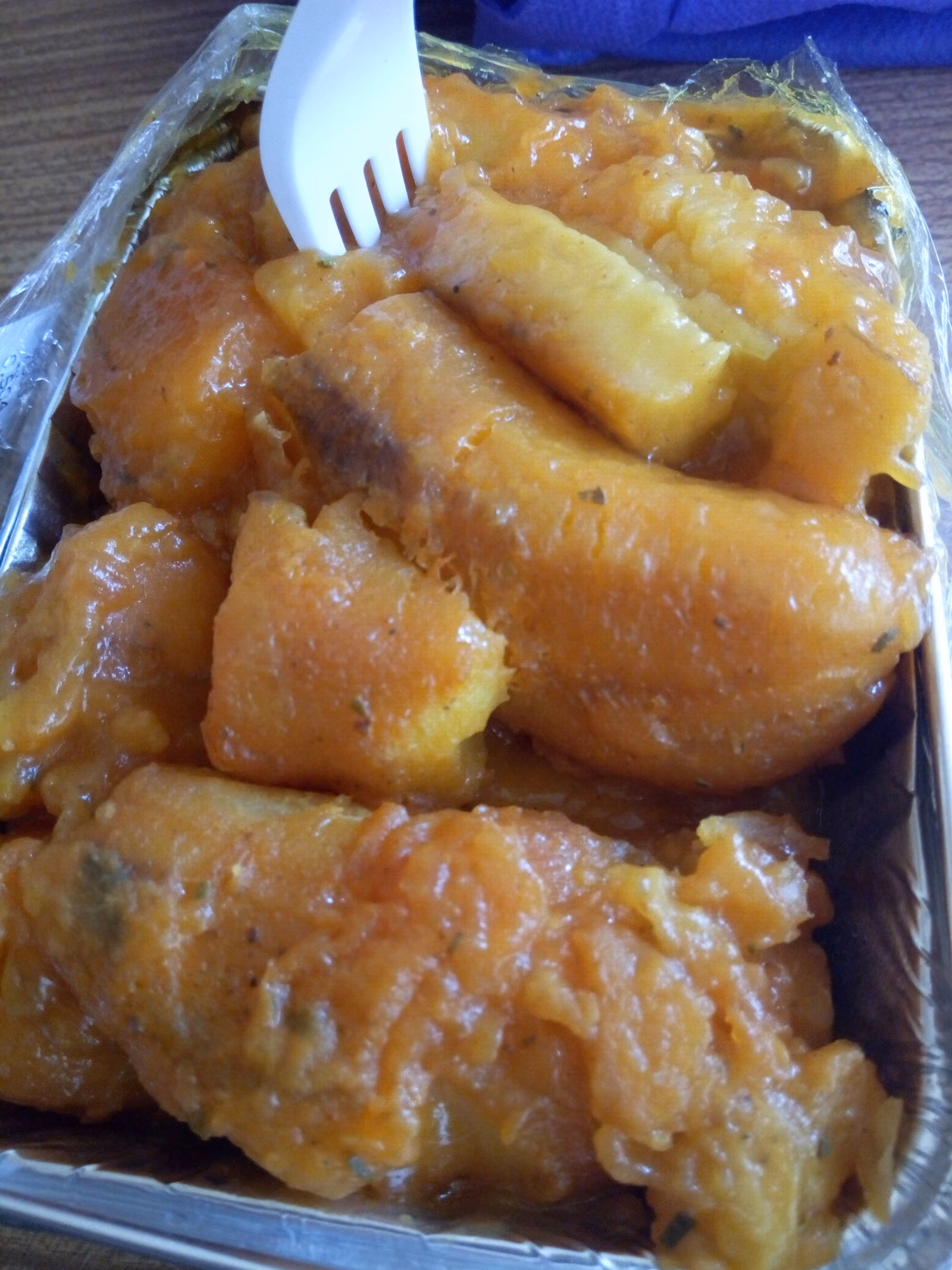 Cooked matoke: soft yellow plantain pieces in their stew.